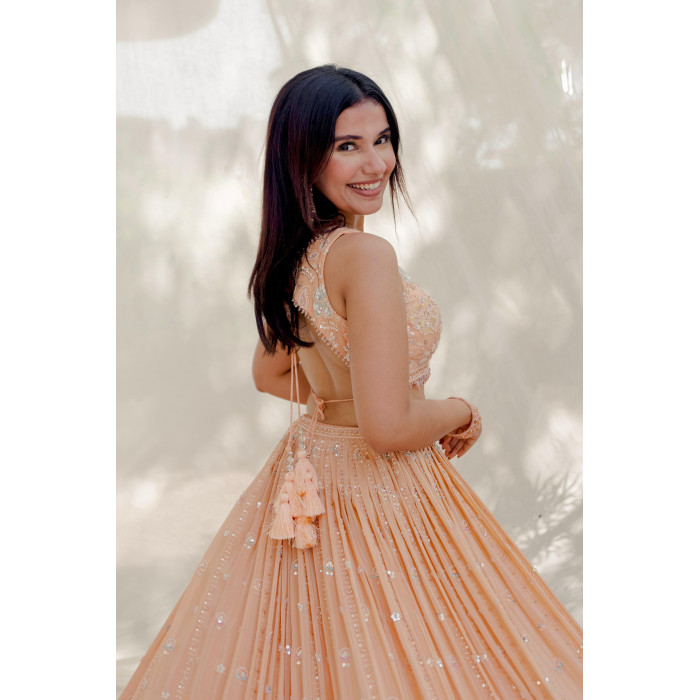 Peach Mirror-Work Lehenga Choli with Tassels for Weddings & Special Occasions